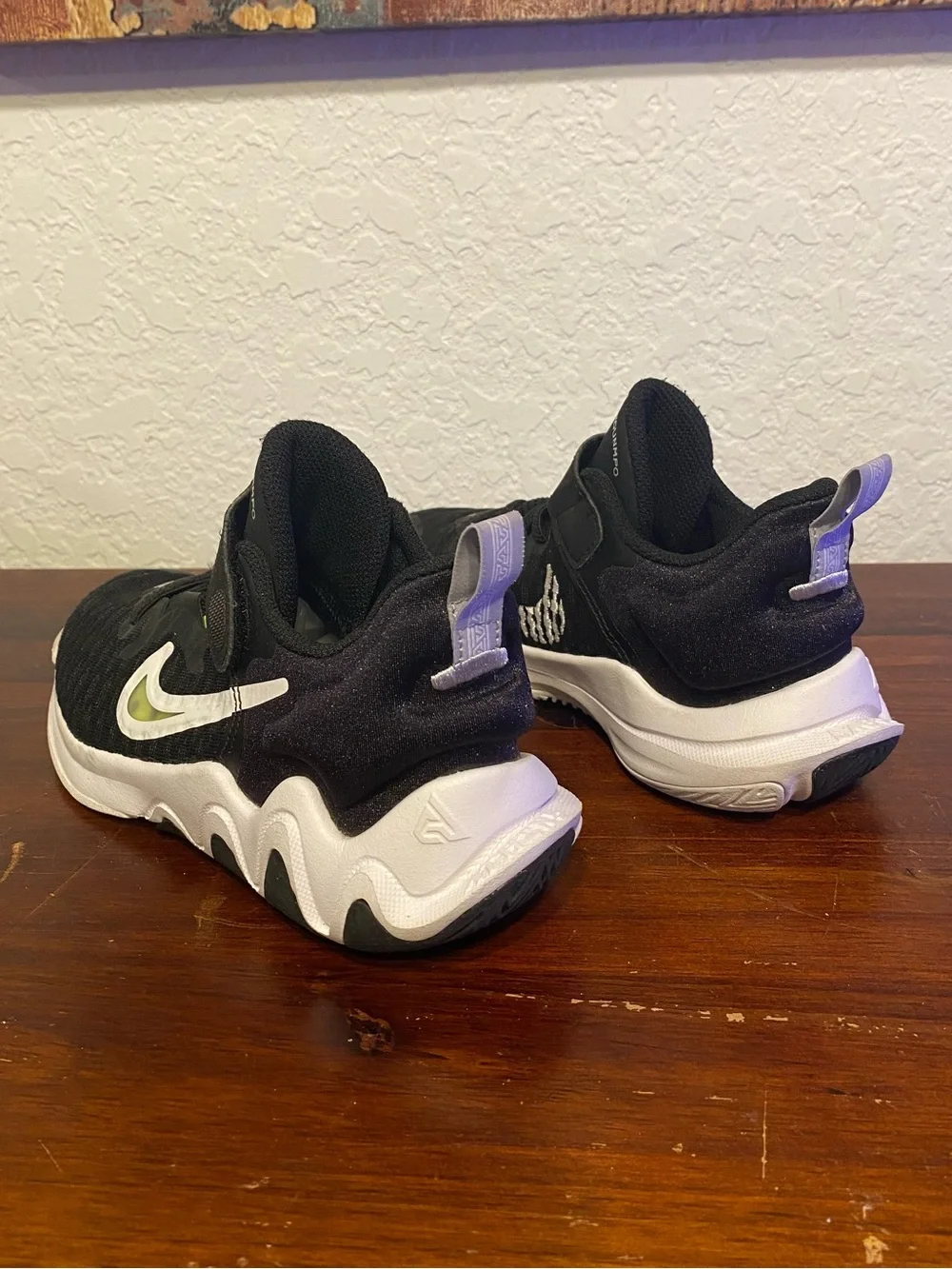 Nike Kids Black Sneakers with White Soles and Lime Accent